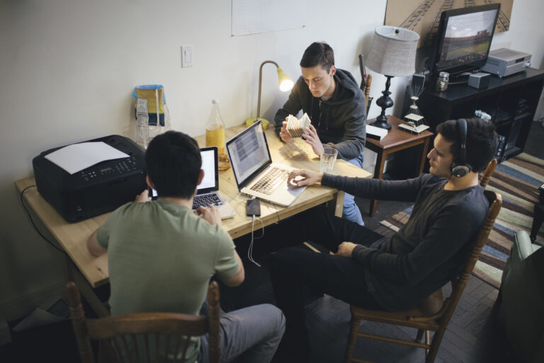 a picture of young people with computers