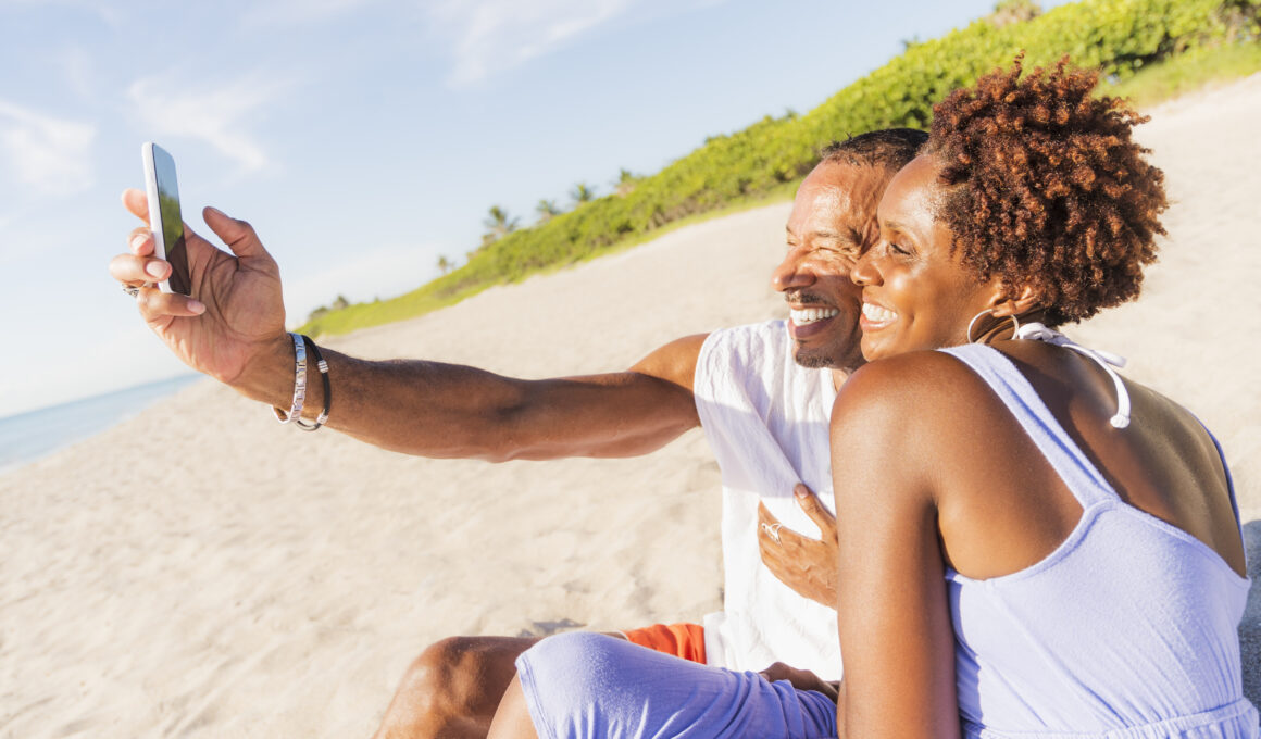A picture of a man and a woman on a beach