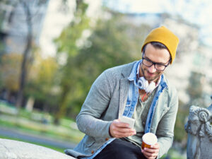 a picture of a man using his phone