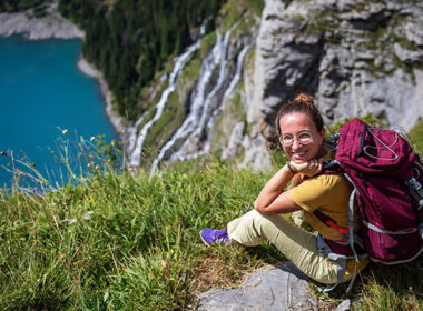Tourist in the mountains in Switzerland on Lake Oeschinensee