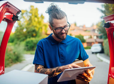 Young man delivering products