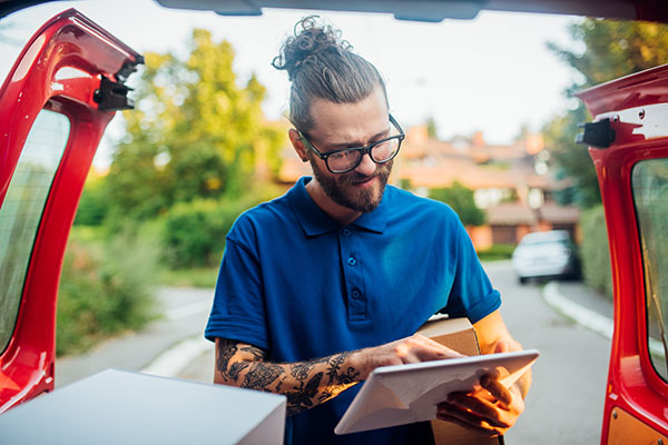 Young man delivering products
